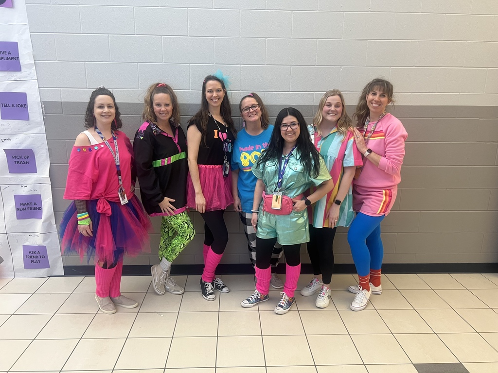 Teachers dressed up for 80s day
