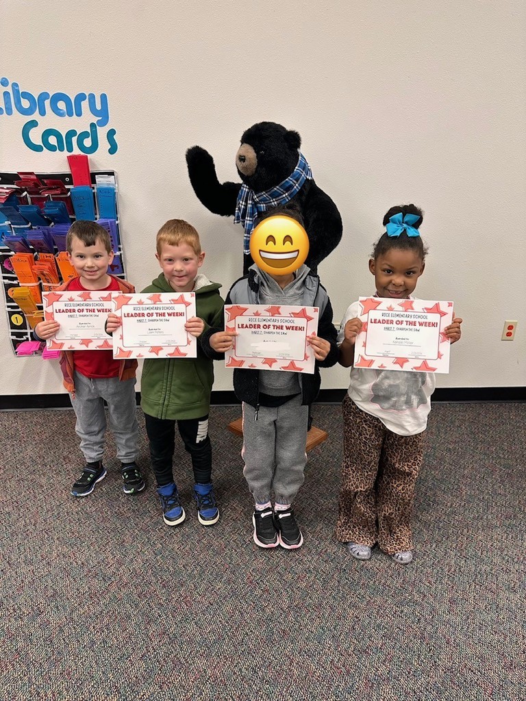 students holding certificates