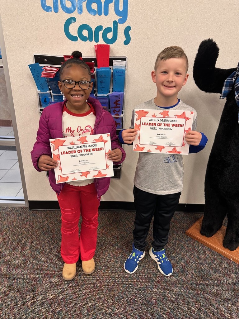 students holding certificates