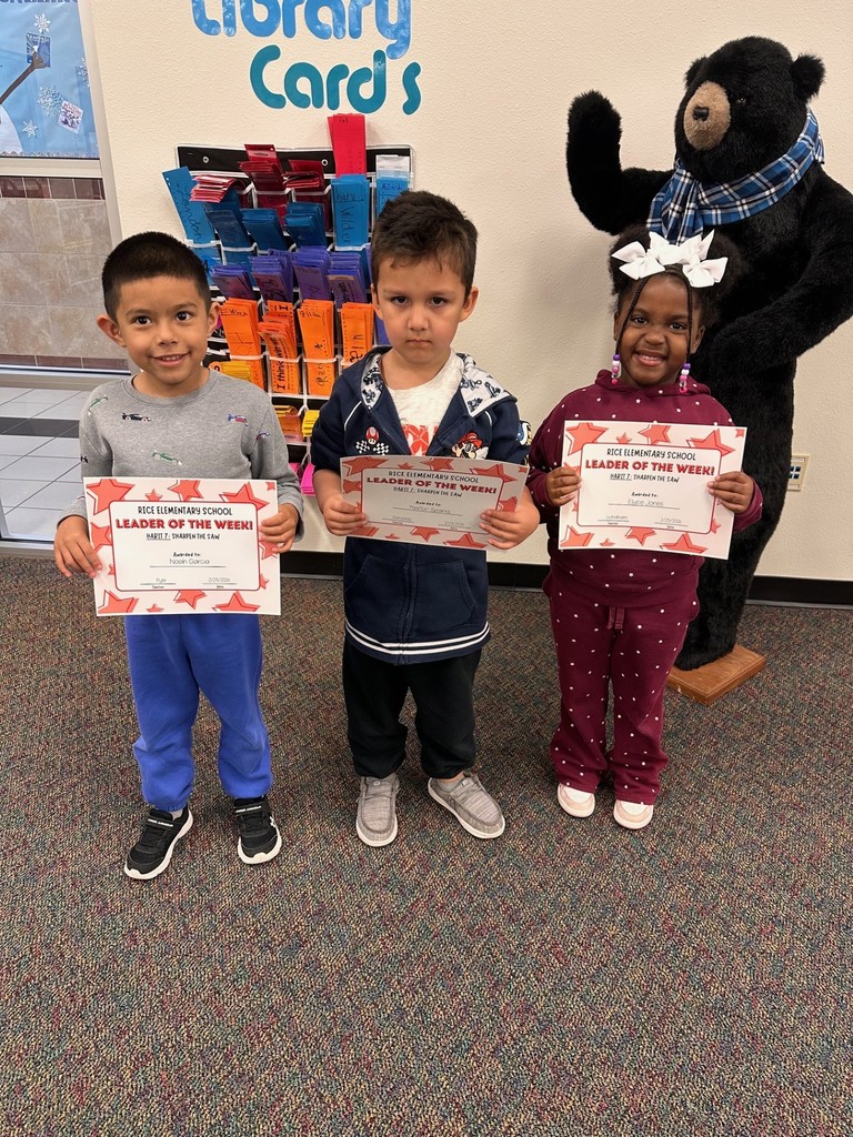 students holding certificates