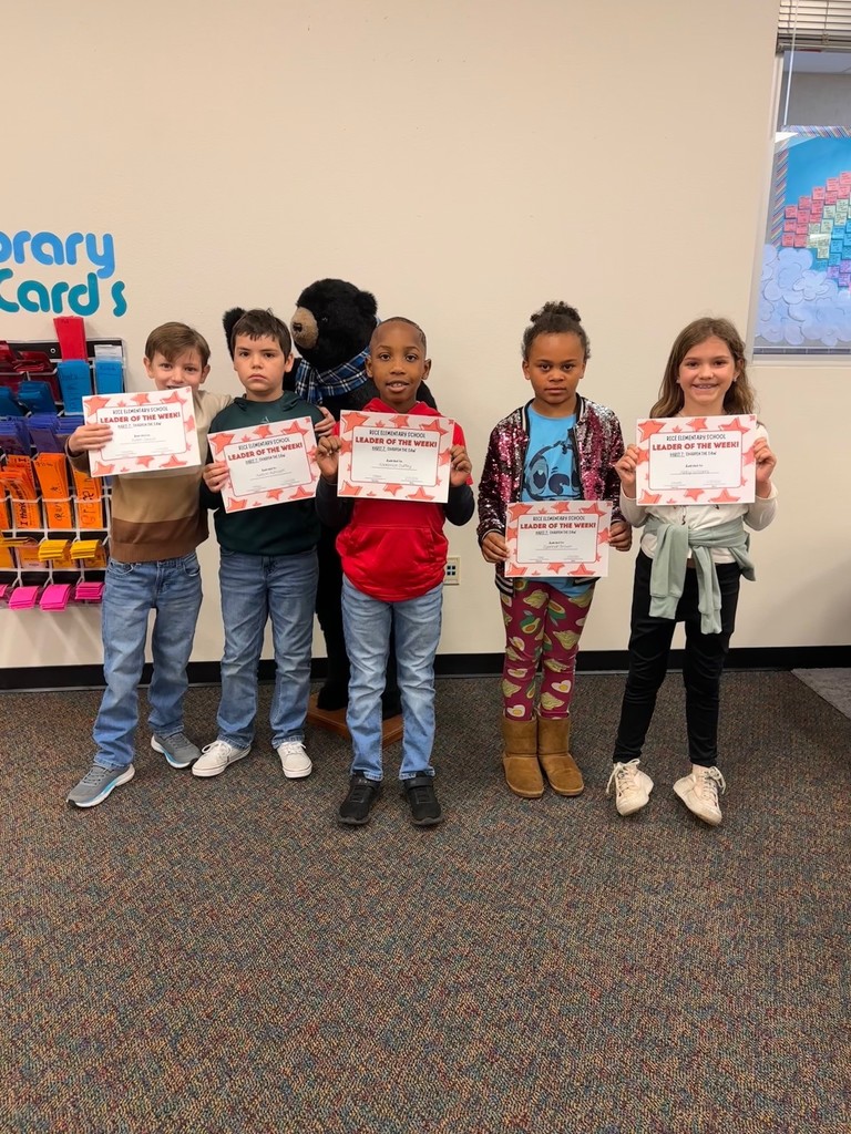 students holding certificates