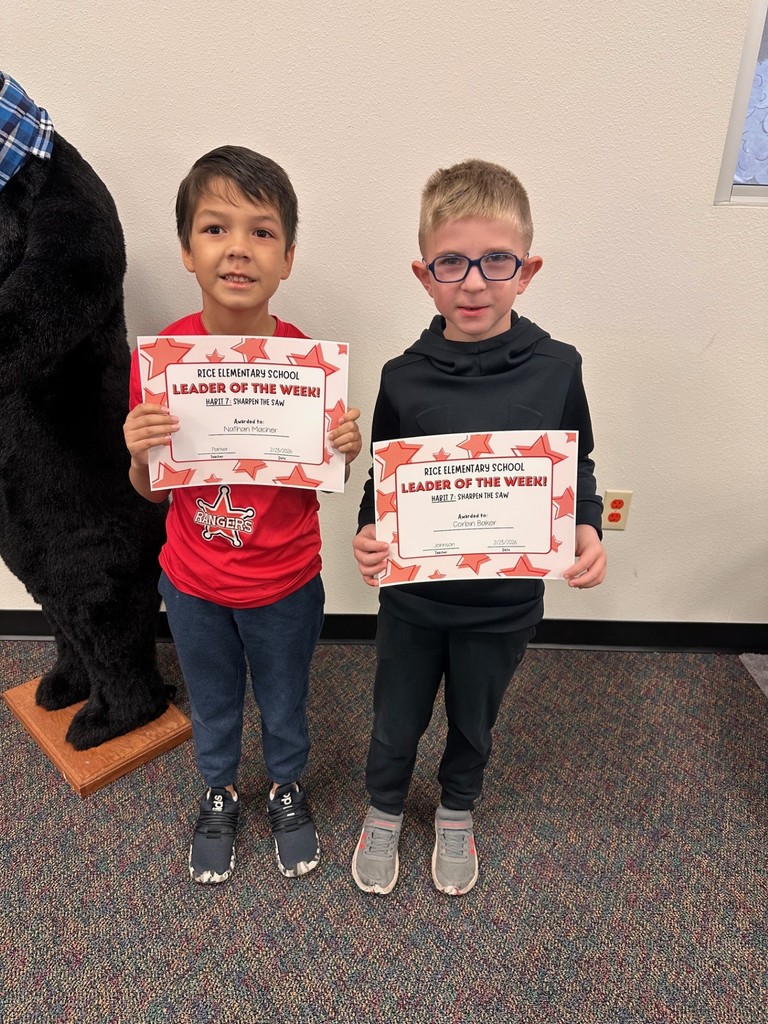 students holding certificates