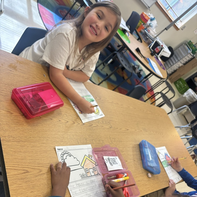 students writing in class