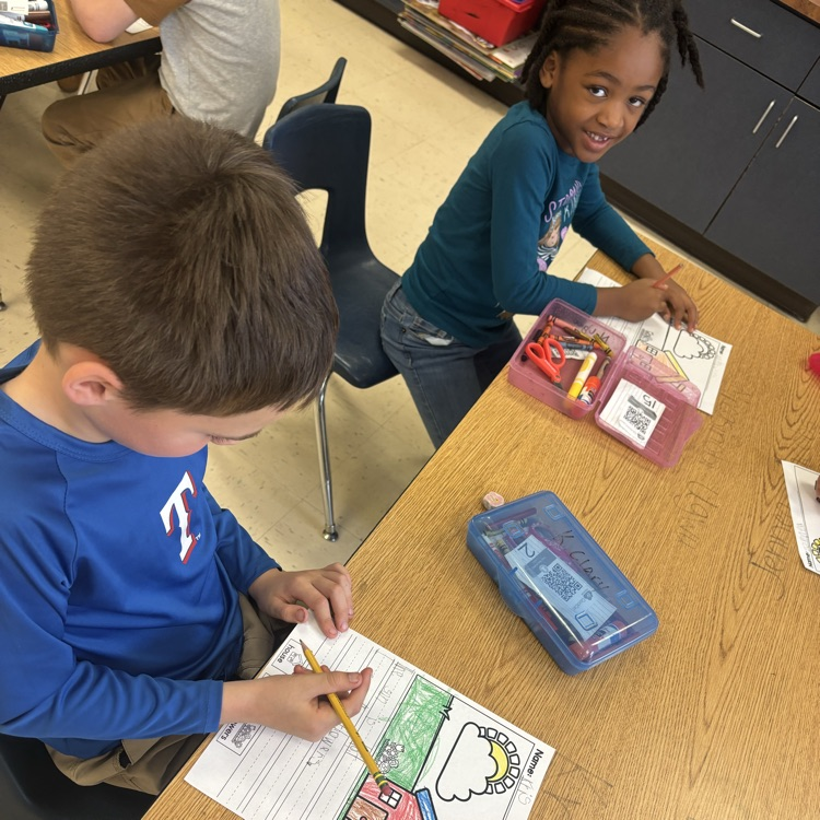 students writing in class