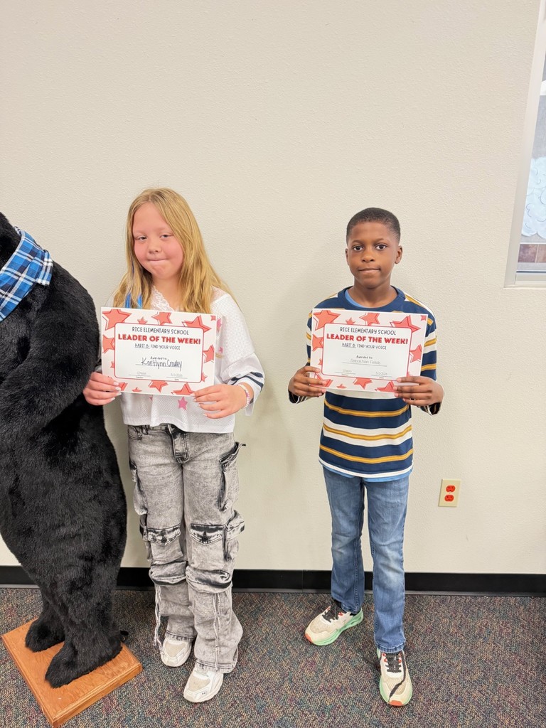 students holding certificates