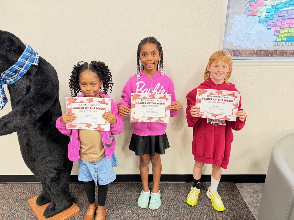students holding certificates