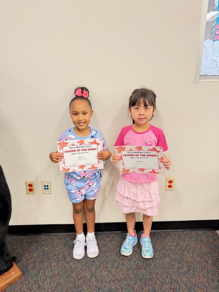 students holding certificates