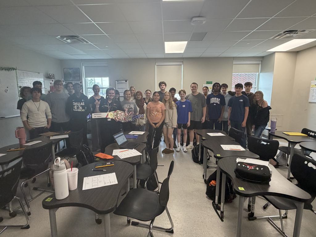 Mrs. Threadgil with the Walk Through Wednesday belt and her students