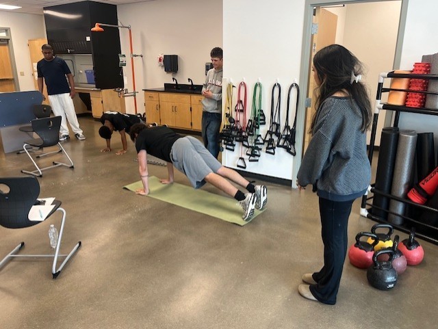 Students doing 60 second planks.