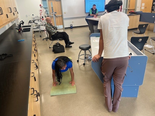 Students doing 60 second planks.