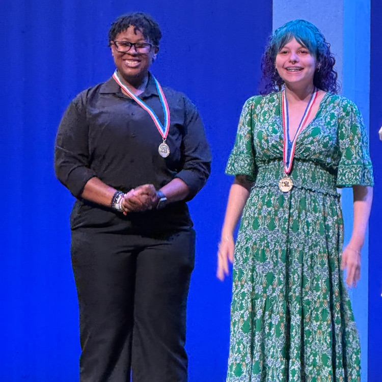  two girls with medals