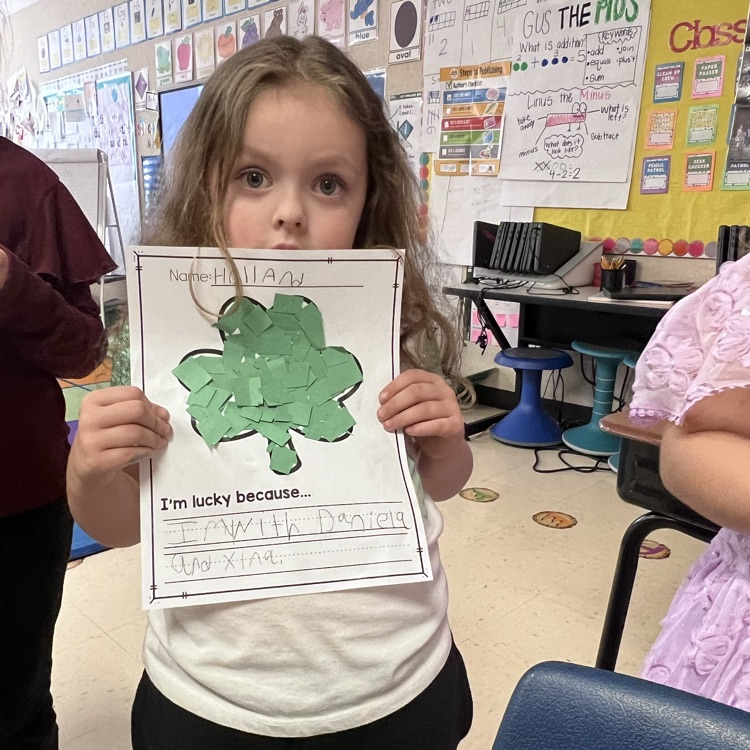 Student showing their lucky writing