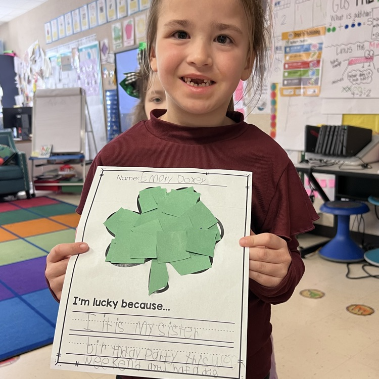 Student showing their lucky writing