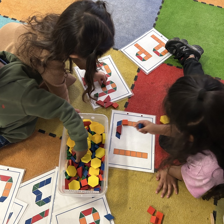 students working with pattern blocks