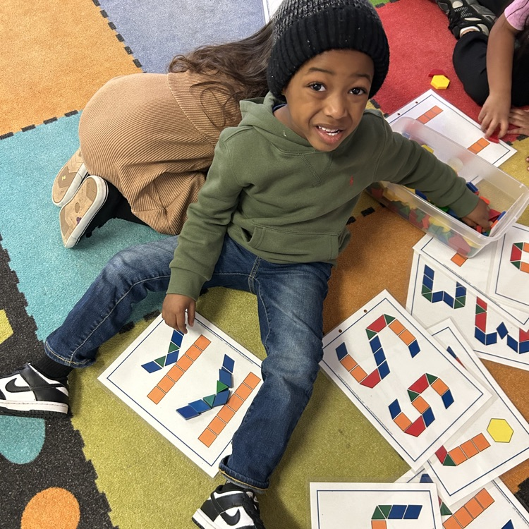 students working with pattern blocks