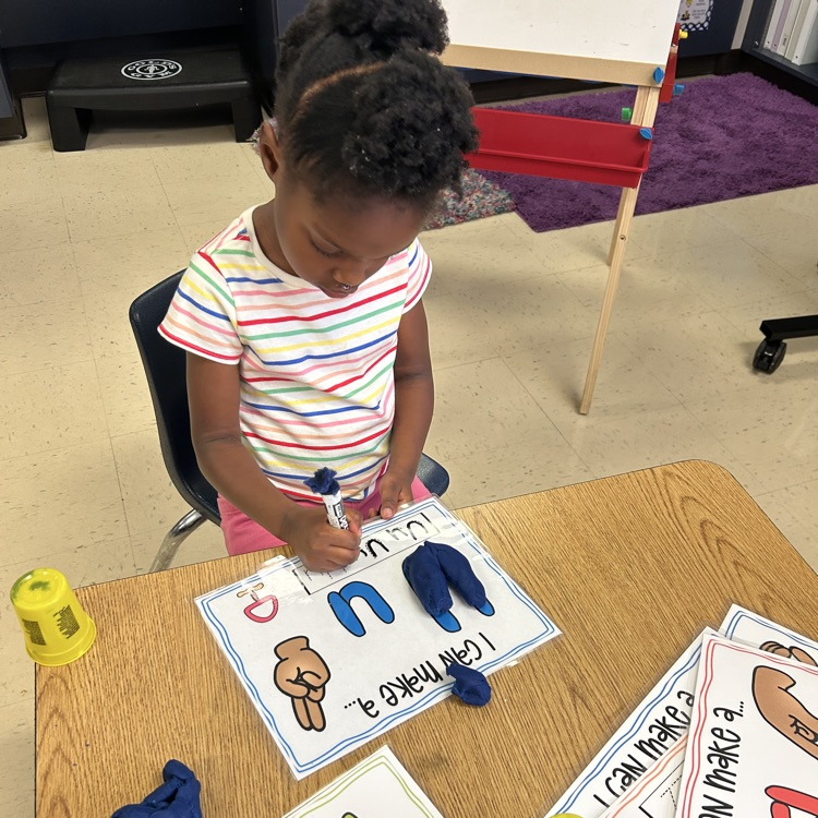 Students working on letter writing
