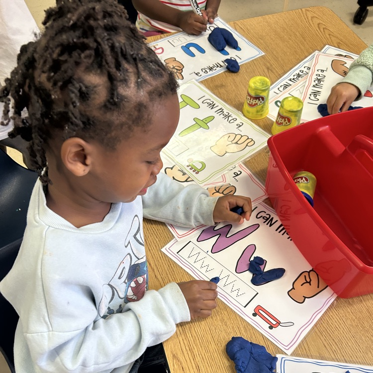 Students working on letter writing