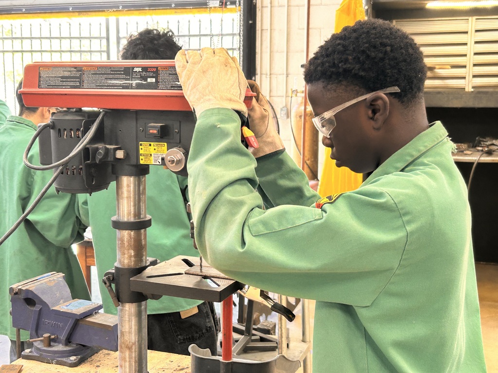 students using a machine