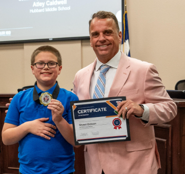 Shawn Dotson with Dr. Crawford at District Board Meeting 