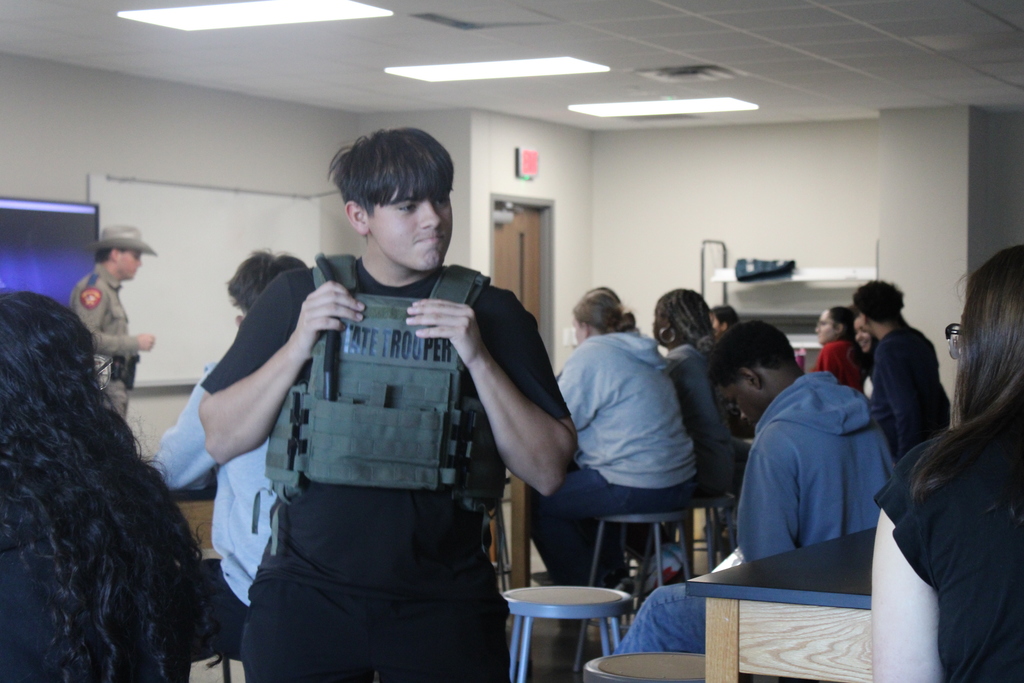 Tyler Legacy forensic science classes during a presentation from a state trooper