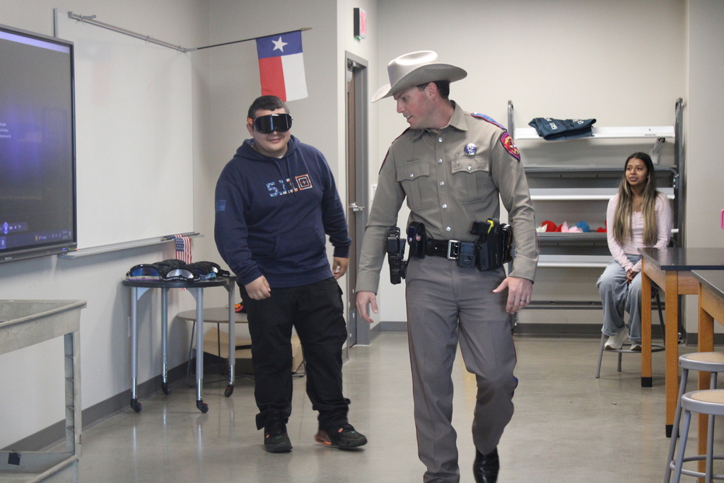 Tyler Legacy forensic science classes during a presentation from a state trooper