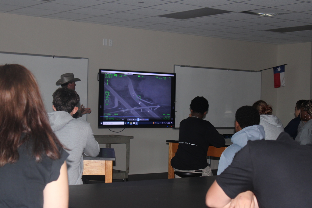 Tyler Legacy forensic science classes during a presentation from a state trooper