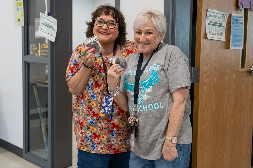 ECHS staff smile with their sweet treats from Freddy's Frozen Custard and Steakburgers!