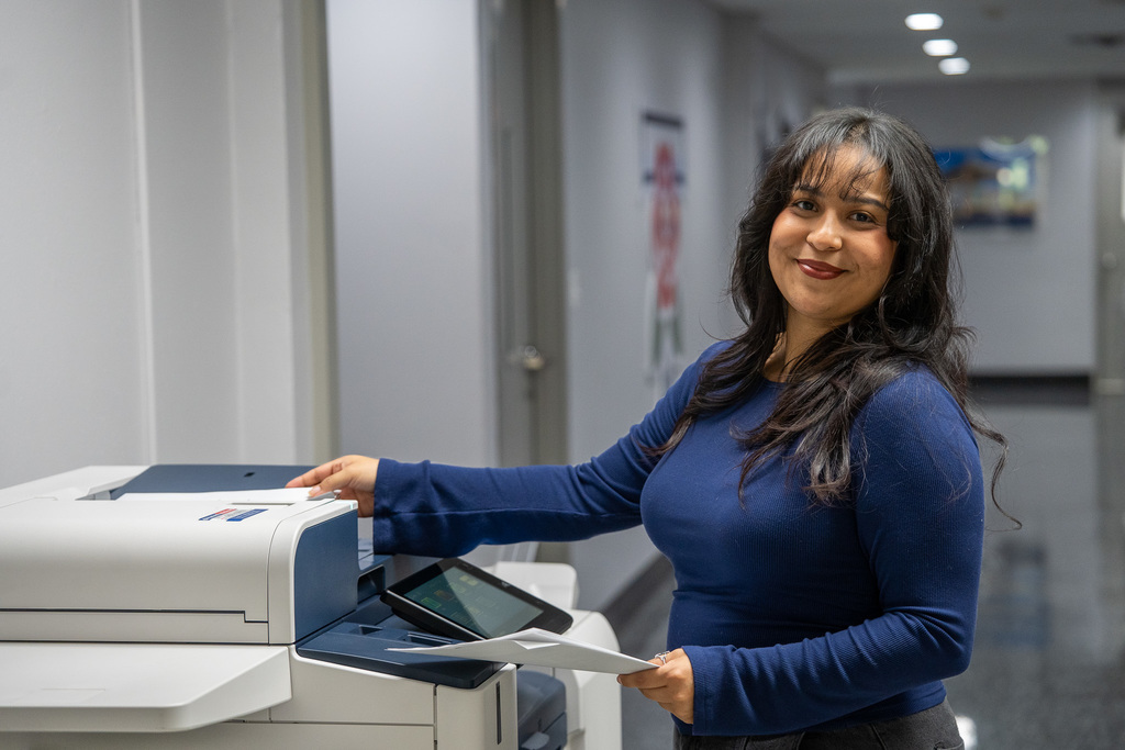 Tyler ISD Paraprofessional smiles during appreciation day.