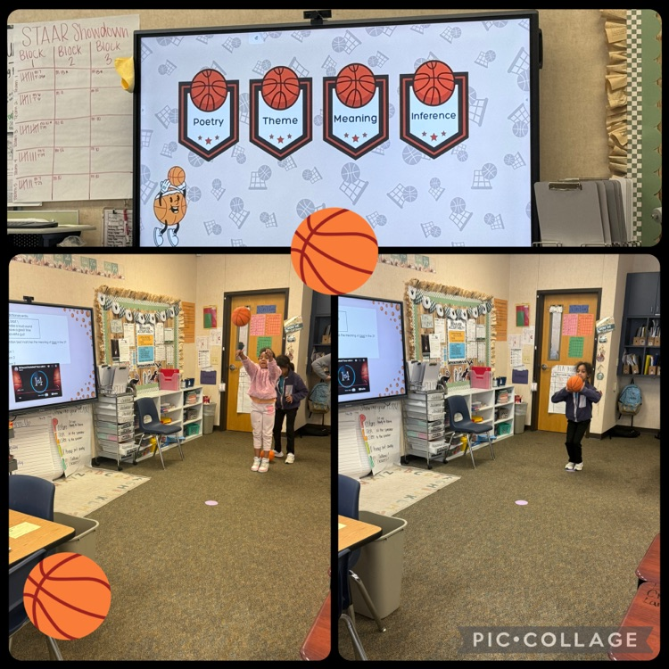 students playing trashketball. students working in groups and holding answer choice cards