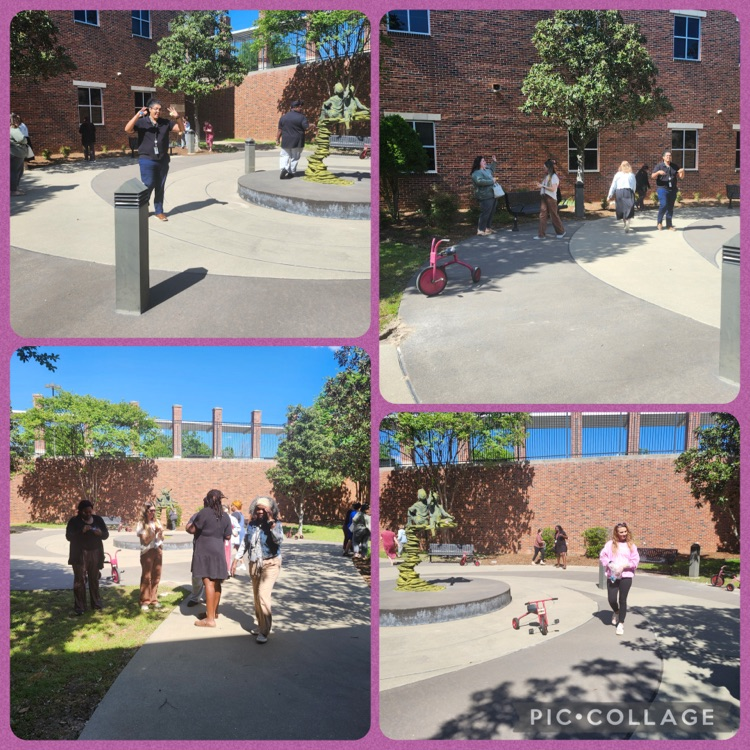 staff and students doing Easter egg hunt