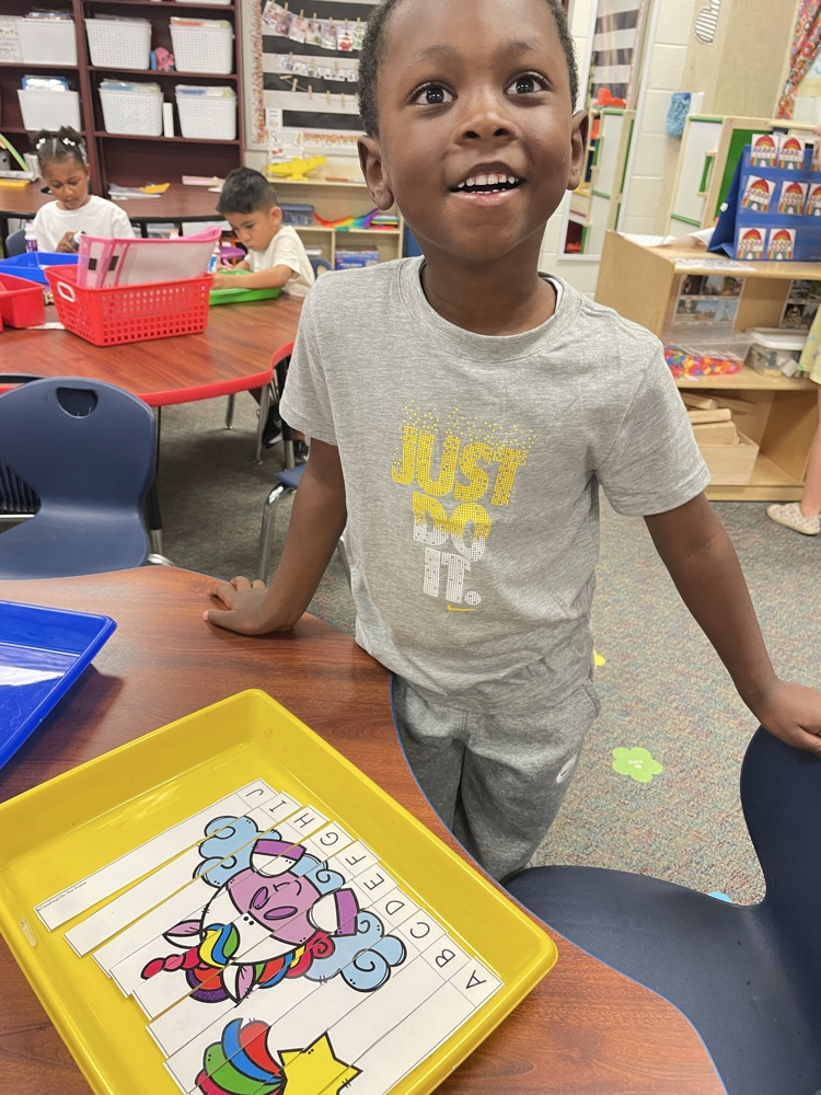 Kid doing a unicorn activity. 