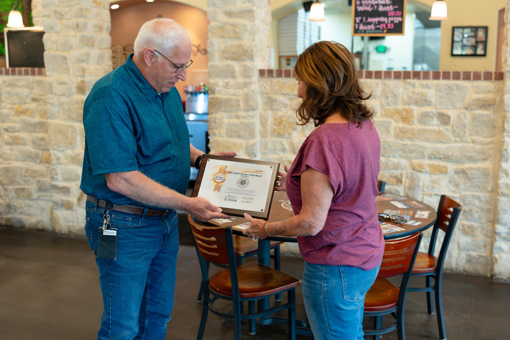 Tyler ISD presents Bruno's Pizza with the 2026 B.R.I.D.G.E. Partner of the Month award.