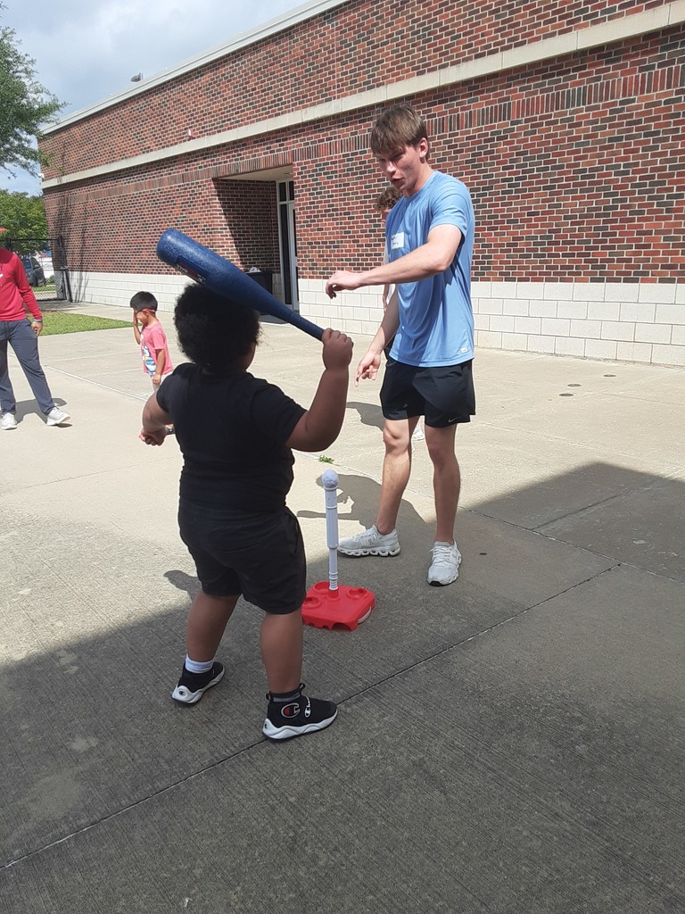 Child playing baseball