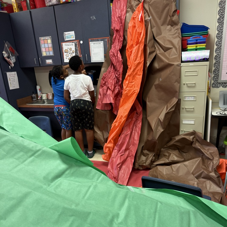 students playing the floor is lava