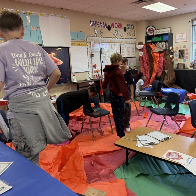 students playing the floor is lava
