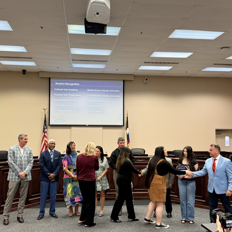 group of people shaking hands