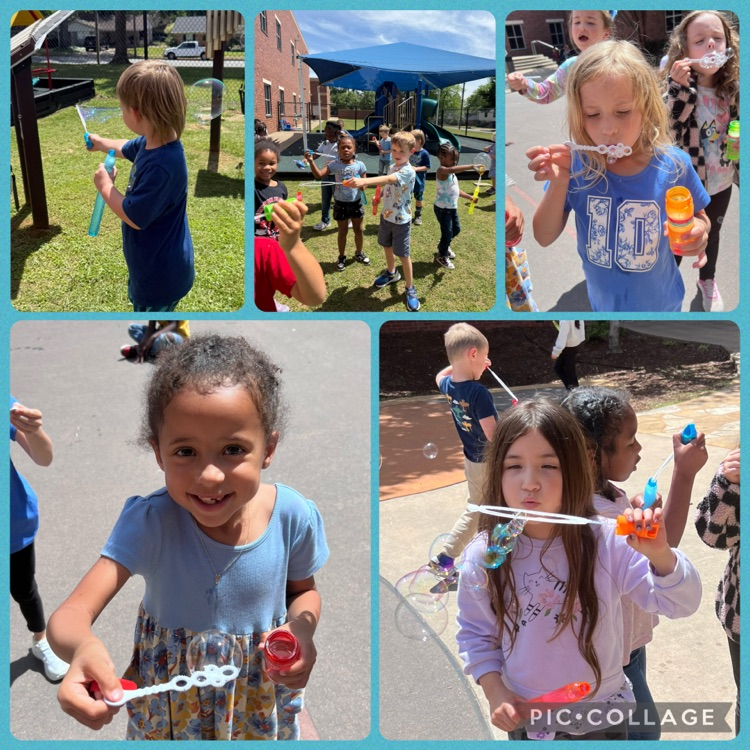 student blowing bubbles 