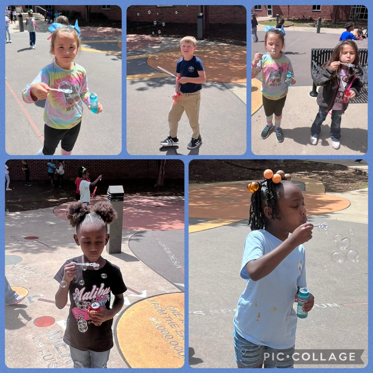 student blowing bubbles 