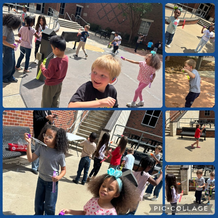 student blowing bubbles 