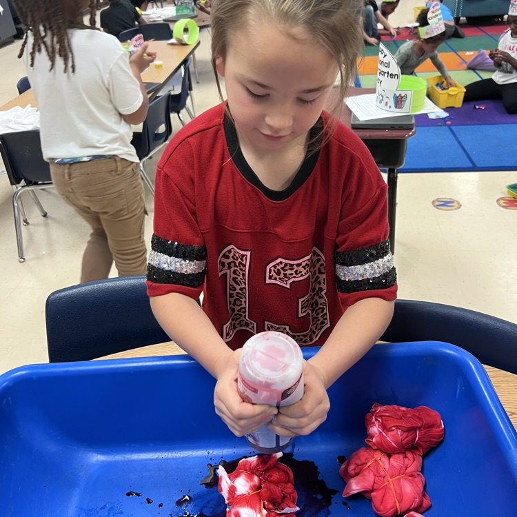student dying a shirt red
