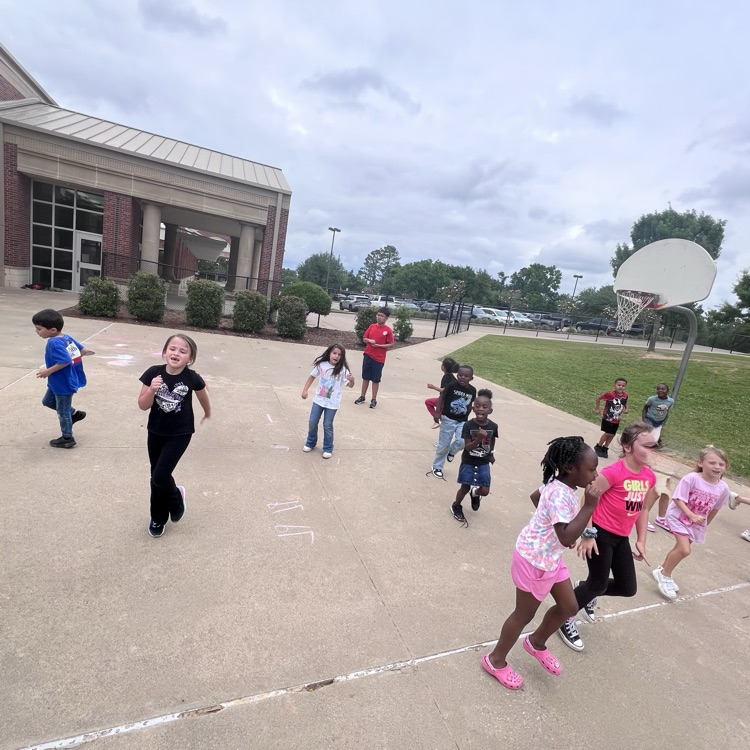 students exercising on the playground