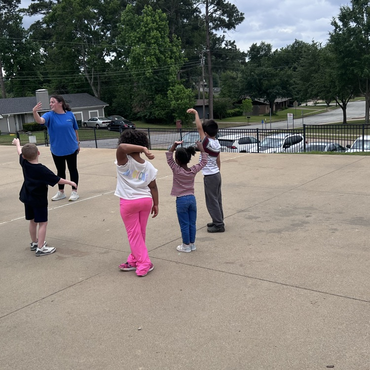 students exercising on the playground