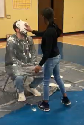 Students get to Pie Mr. Harbour in the face