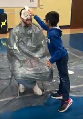 Students get to Pie Mr. Harbour in the face