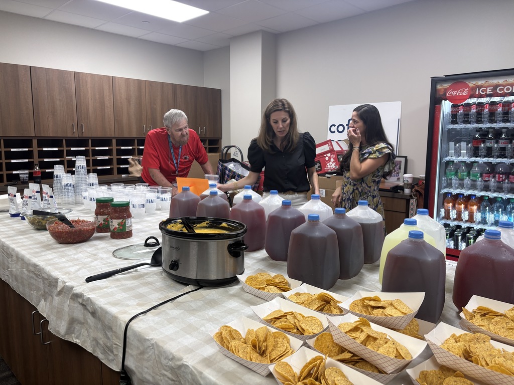 Tyler Legacy staff getting nachos from PTA