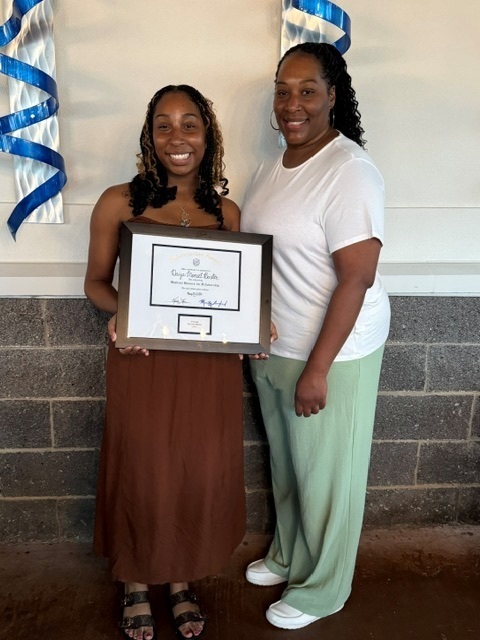 student with certificate