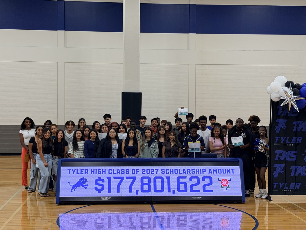 Juniors displaying scholarships amounts