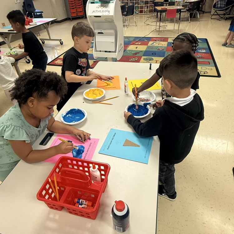 students doing a puffy paint ice cream craft