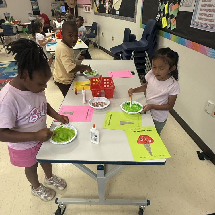 students doing a puffy paint ice cream craft