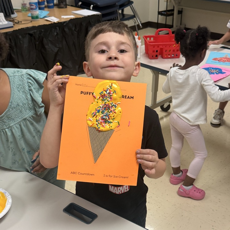 students doing a puffy paint ice cream craft